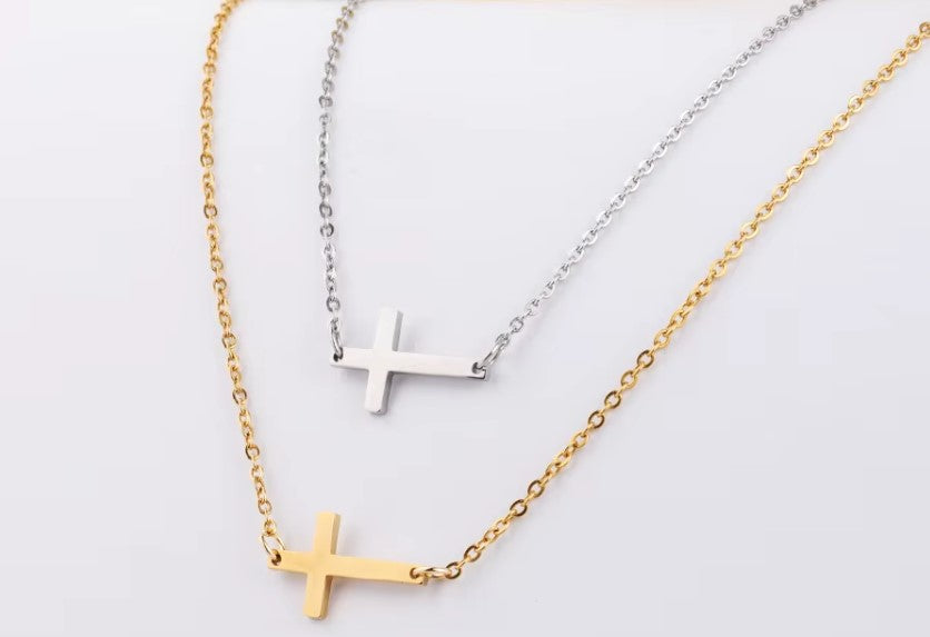 Sideways cross pendant necklace