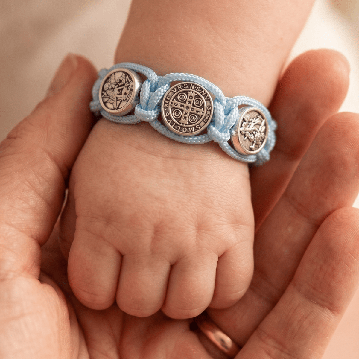 St. Benedict Blue Cord Baby Bracelet - Blue - JMJ Catholic Productsvariant