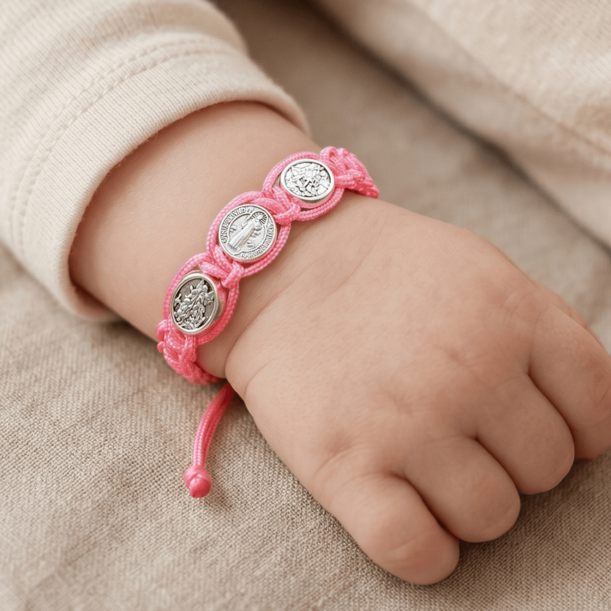 St. Benedict Pink Cord Baby Bracelet - Pink - JMJ Catholic Productsvariant
